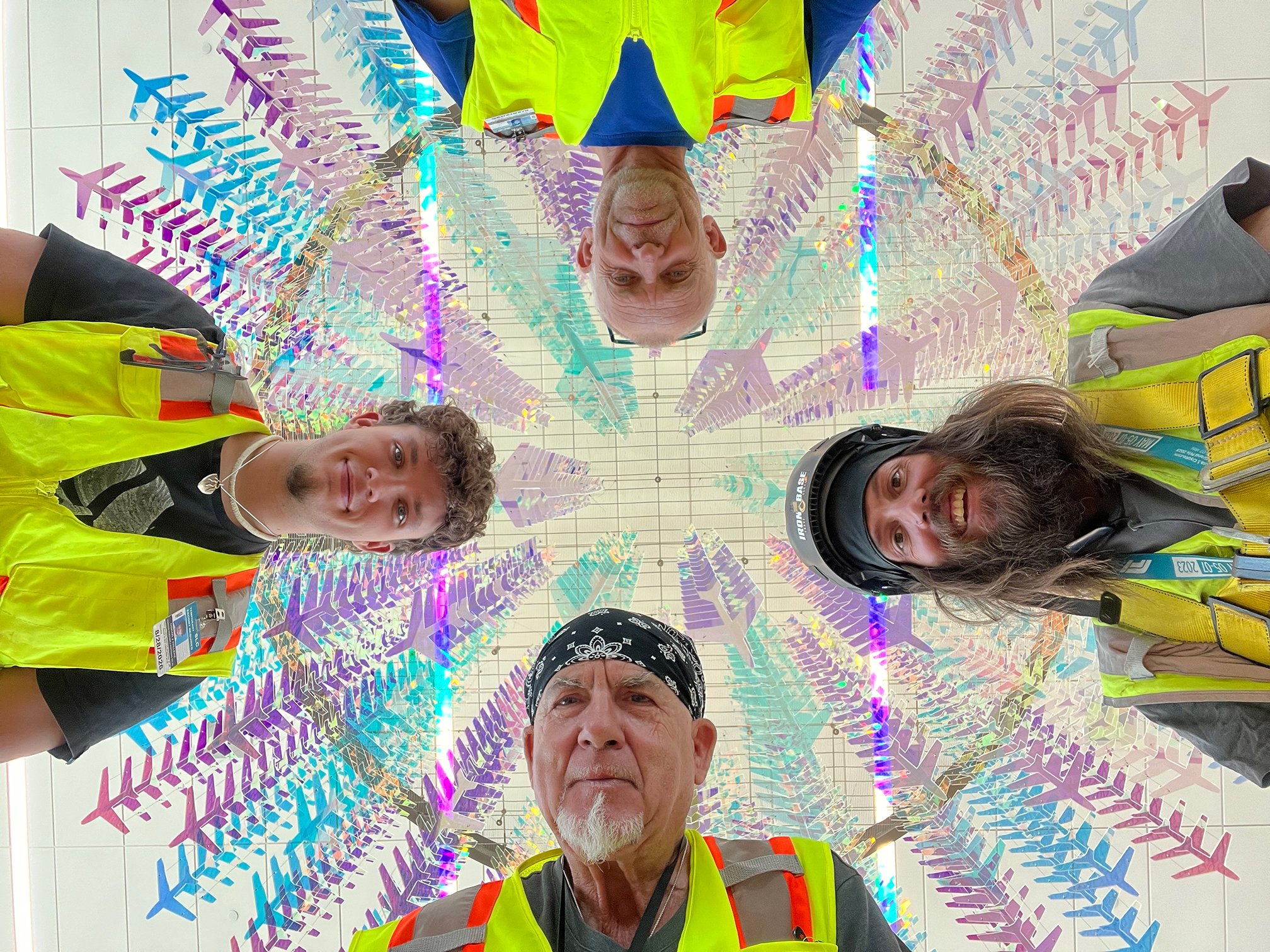 Gordon and Team with Crossroads to the World in the background